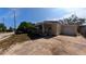 Cozy single-story home with a covered porch and a detached garage at 39 S College Ave, Maitland, FL 32751