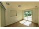 Room featuring light wood flooring, white walls and a window with a nice view at 39 S College Ave, Maitland, FL 32751