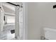 Bathroom with a marble bathtub, black accents, and a separate shower at 3926 Ventura Place, Orlando, FL 32822