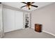 Neutral bedroom featuring a closet, carpeted floors, and light-colored walls at 3926 Ventura Place, Orlando, FL 32822