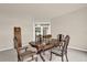 Elegant dining room featuring a wooden table set and access to an enclosed patio at 3926 Ventura Place, Orlando, FL 32822