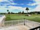 Scenic golf course view from the outdoor patio, perfect for relaxing and enjoying the outdoors at 3926 Ventura Place, Orlando, FL 32822