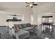 Open concept living area with stylish black marble floors, a comfortable couch, and a pool table at 3926 Ventura Place, Orlando, FL 32822