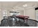 Spacious living room featuring black marble flooring, and an open layout at 3926 Ventura Place, Orlando, FL 32822