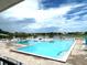 Beautiful community pool offers refreshing water, lounge chairs, and great views at 3926 Ventura Place, Orlando, FL 32822