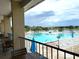 Inviting community pool with comfortable seating areas, ideal for relaxation and socializing at 3926 Ventura Place, Orlando, FL 32822