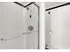Glass-encased shower with black trim and silver shower head at 3926 Ventura Place, Orlando, FL 32822