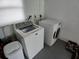Laundry area featuring a modern washing machine and dryer set at 4225 Ne 25Th Ave, Ocala, FL 34479