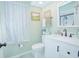 Updated bathroom with a white vanity, modern fixtures, and a shower at 4545 Southfield Ave, Orlando, FL 32812