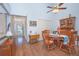Dining room features vaulted ceiling, wood table, and natural light at 4545 Southfield Ave, Orlando, FL 32812