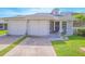 Beautiful home featuring well-manicured lawn, a welcoming entrance, and lovely curb appeal at 4545 Southfield Ave, Orlando, FL 32812