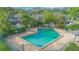 Community pool surrounded by lush landscaping, offering a refreshing outdoor amenity at 4545 Southfield Ave, Orlando, FL 32812
