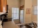 Bright kitchen with a stainless steel sink, appliances, and ample counter space, perfect for cooking and entertaining at 4778 Vero Beach Pl, Kissimmee, FL 34746