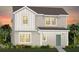 Charming two-story home featuring a modern design with a combination of siding and a well-manicured lawn at 5021 Starling Bird Ln, St Cloud, FL 34771