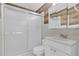 Bathroom featuring a glass-enclosed shower, vanity with a mirror, and a toilet at 517 Ivanhoe Way, Casselberry, FL 32707