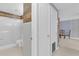 Bathroom featuring tiled walls, a glass-enclosed shower, and modern fixtures at 517 Ivanhoe Way, Casselberry, FL 32707