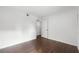 Bedroom featuring wood floors and neutral walls at 5301 Burning Tree Dr # F, Orlando, FL 32811