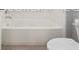 Bathroom with neutral tile flooring, white cabinetry, and chrome fixtures at 5550 Sabal Dr, St Cloud, FL 34771
