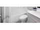 Bathroom with a sink, toilet and a shower area gives you all of the necessities at 5550 Sabal Dr, St Cloud, FL 34771