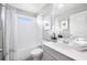 Well-lit bathroom with a shower-tub combo and a clean, white aesthetic at 5550 Sabal Dr, St Cloud, FL 34771