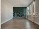 Spacious bedroom with a modern accent wall and bright, natural light at 5550 Sabal Dr, St Cloud, FL 34771