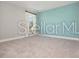 Spacious bedroom with soft carpet, calm color scheme and abundant natural light at 5550 Sabal Dr, St Cloud, FL 34771