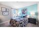 Stylish bedroom with colorful decor, and bright natural light at 5550 Sabal Dr, St Cloud, FL 34771