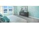 This primary bedroom offers a tranquil retreat with its soft hues and serene water view at 5550 Sabal Dr, St Cloud, FL 34771