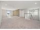Spacious upper level bonus room, with neutral carpeting and a view of the lake at 5550 Sabal Dr, St Cloud, FL 34771