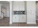 Convenient laundry room with cabinets and side-by-side washer and dryer at 5550 Sabal Dr, St Cloud, FL 34771