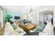 Spacious open-concept living room with modern decor and plenty of natural light at 5550 Sabal Dr, St Cloud, FL 34771