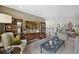 Comfortable living room featuring stylish furniture and custom built-ins at 5550 Sabal Dr, St Cloud, FL 34771