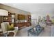 Inviting living room with custom wood shelving, cozy seating, and stylish decor at 5550 Sabal Dr, St Cloud, FL 34771