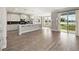 Bright and airy living area with a sliding glass door to the backyard at 5550 Sabal Dr, St Cloud, FL 34771