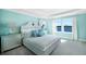 Serene main bedroom with lake views, a plush bed, and modern furnishings at 5550 Sabal Dr, St Cloud, FL 34771