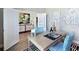 Bright office featuring a wooden desk, blue chair, and ample storage space at 5550 Sabal Dr, St Cloud, FL 34771