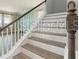Stylish stairway with modern railings at 5550 Sabal Dr, St Cloud, FL 34771