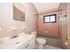 Traditional full bathroom features a tub with a shower, toilet, vanity with sink, and a mirror at 5604 Astoria Pl, Orlando, FL 32808