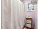 Bathroom showcasing the bathtub/shower with a white shower curtain and organized towels in the corner at 618 Acapulca Way, Altamonte Springs, FL 32714
