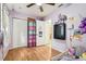 bedroom featuring two closets, a display case, and colorful decor at 618 Acapulca Way, Altamonte Springs, FL 32714