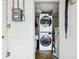 Laundry room with stacked washer and dryer at 618 Acapulca Way, Altamonte Springs, FL 32714