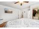 Main bedroom offers a wall-mounted TV and access to a walk-in closet at 618 Acapulca Way, Altamonte Springs, FL 32714