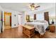 Main bedroom includes a wood dresser, trunk, and access to a walk-in closet at 618 Acapulca Way, Altamonte Springs, FL 32714