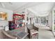 Bright sun room with comfortable seating and a view of the pool at 618 Acapulca Way, Altamonte Springs, FL 32714