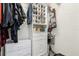 Organized walk-in closet featuring custom shelving and storage solutions for clothing and accessories at 618 Acapulca Way, Altamonte Springs, FL 32714