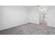 A bright bedroom offers neutral carpeting and ensuite bathroom access at 716 Daring Dr, Davenport, FL 33837