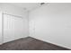 Carpeted bedroom features a double door closet at 716 Daring Dr, Davenport, FL 33837