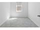 Cozy bedroom with tile flooring, a window, and neutral paint at 716 Daring Dr, Davenport, FL 33837