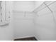 A walk-in closet features shelving and carpeted flooring at 716 Daring Dr, Davenport, FL 33837