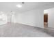 Open concept living room featuring tile flooring and ensuite bathroom access at 716 Daring Dr, Davenport, FL 33837